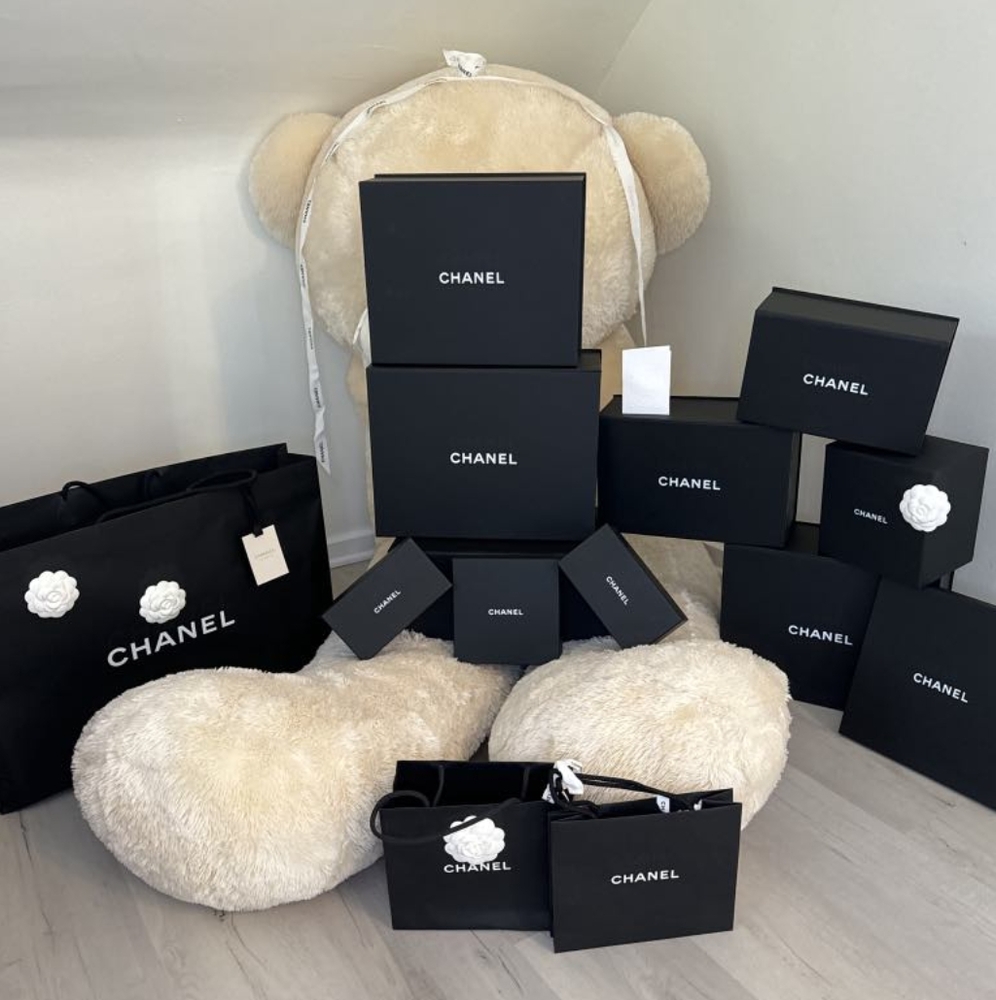 30 Designer BOXES & BAGS 
wrapping paper in most.